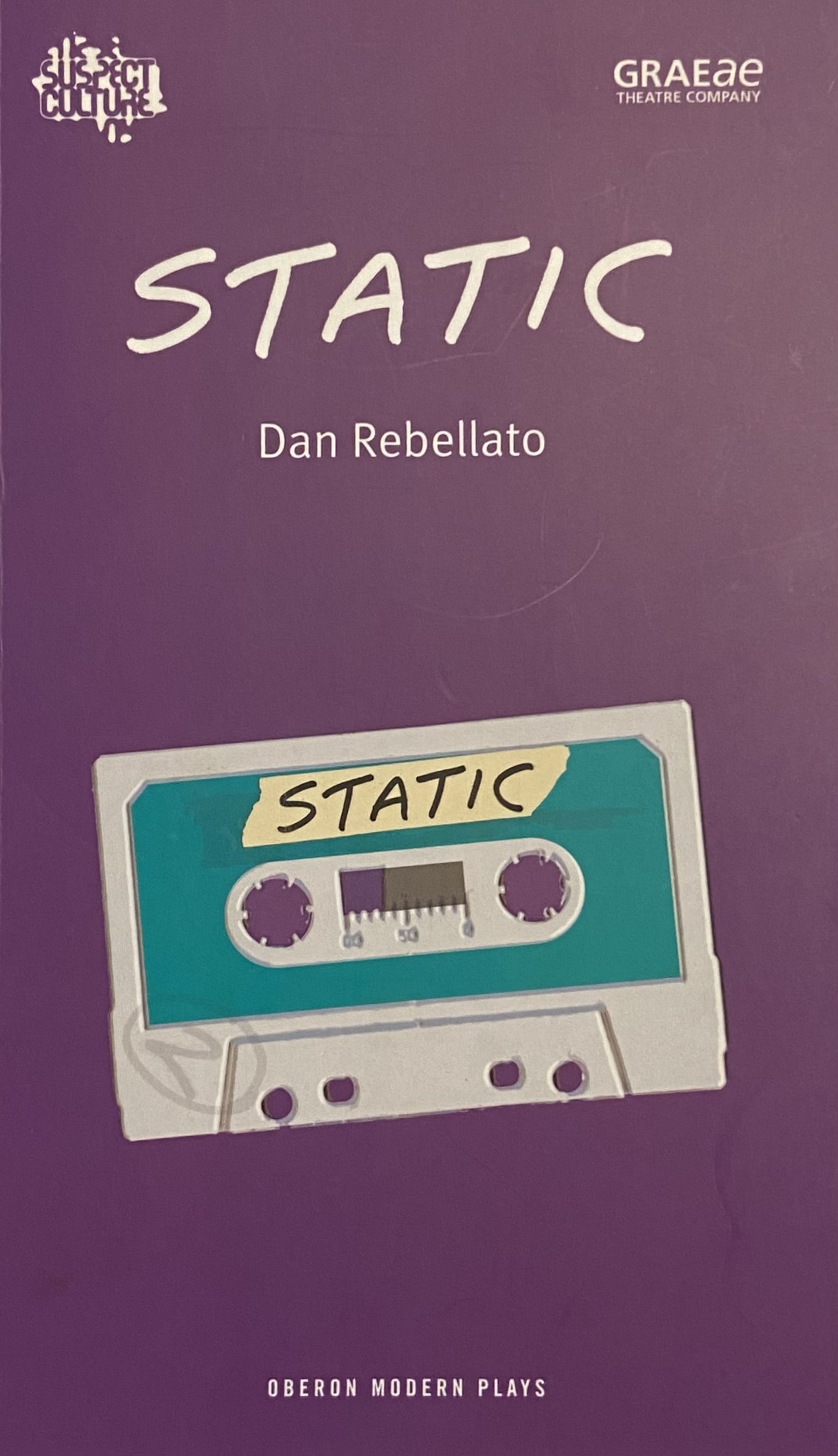 Poster for Static. A simple cassette tape is on a purple background.