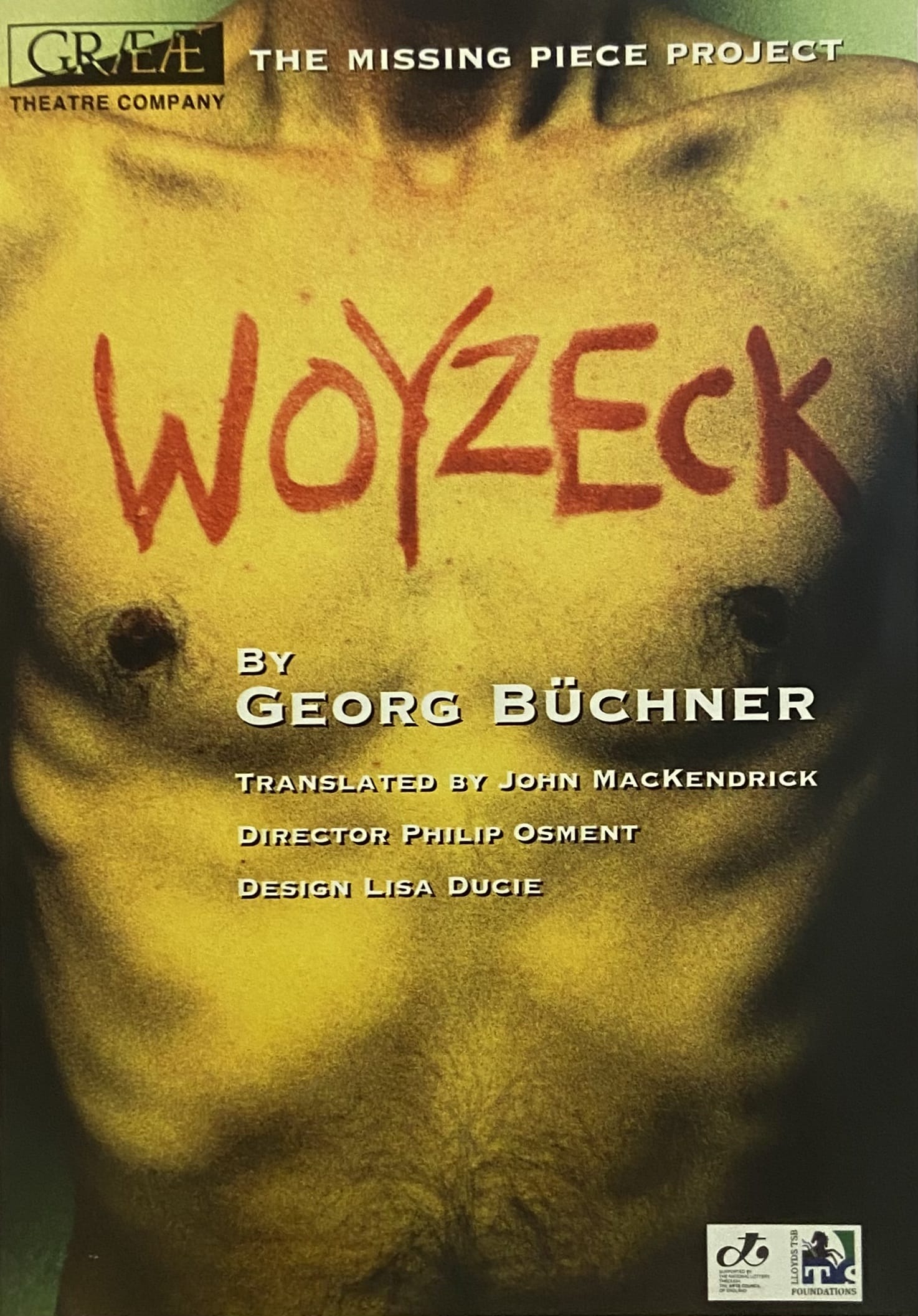 A poster for Graeae's production of 'Woyzeck'. The poster is a picture of a man's bare chest with 