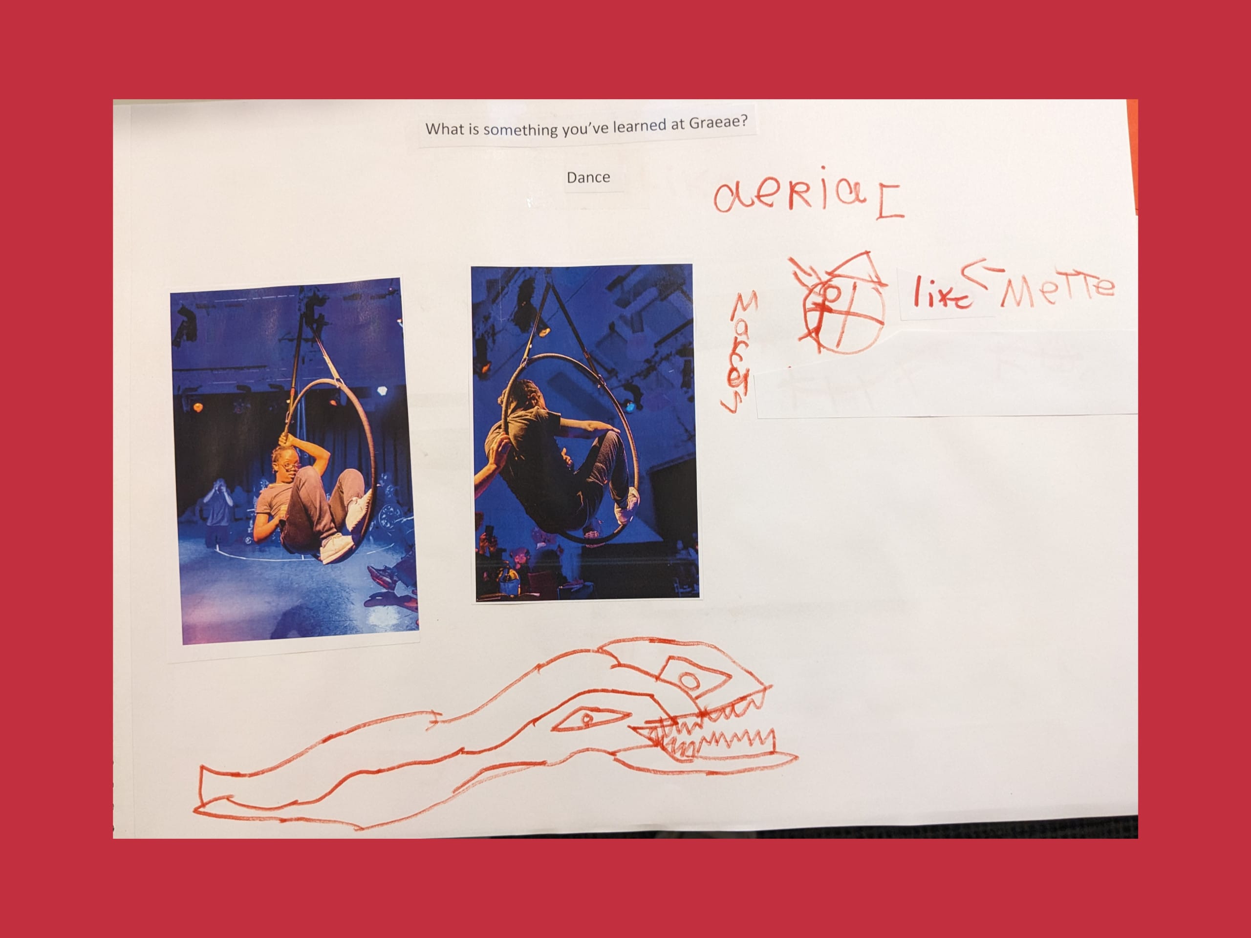 Two pictures of Marcus doing aerial work are shown. His is sitting in a circular aerial hoop. Marcus has drawn the same hoop next to it, he has written Marcus and like Mette on the image. At the bottom, he has also drawn two snakes.