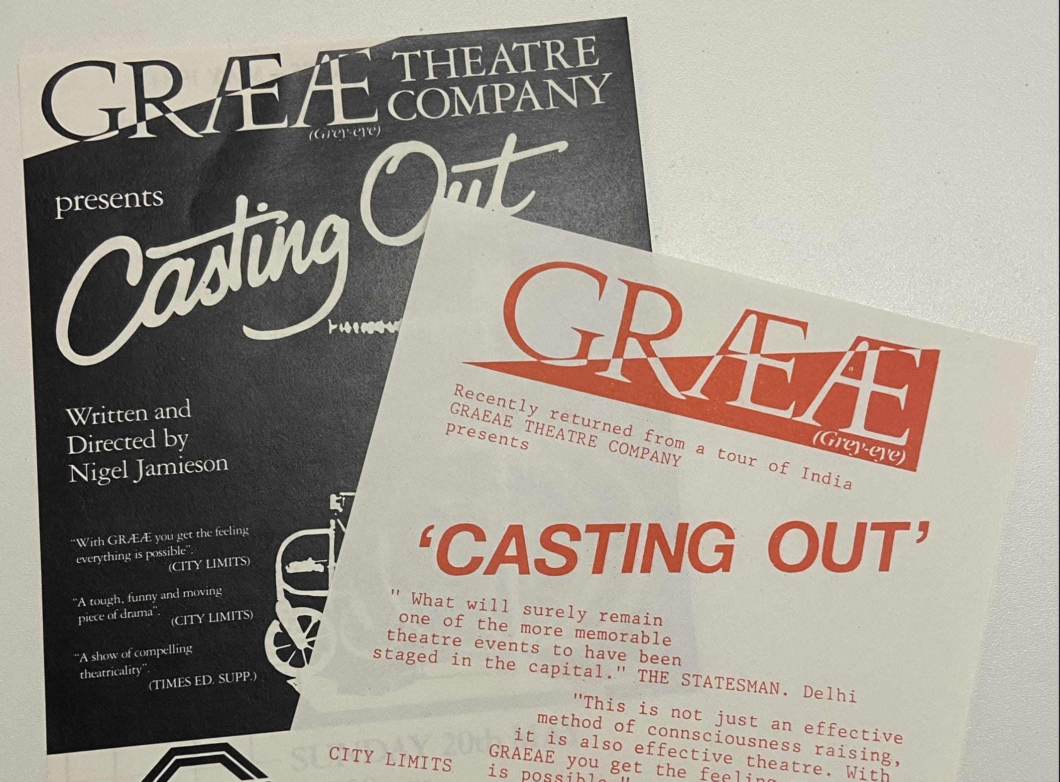 Two flyers for the production are placed on top of each other. They both read the title of the production with the Graeae logo at the top. There are tour dates and review quotes listed.